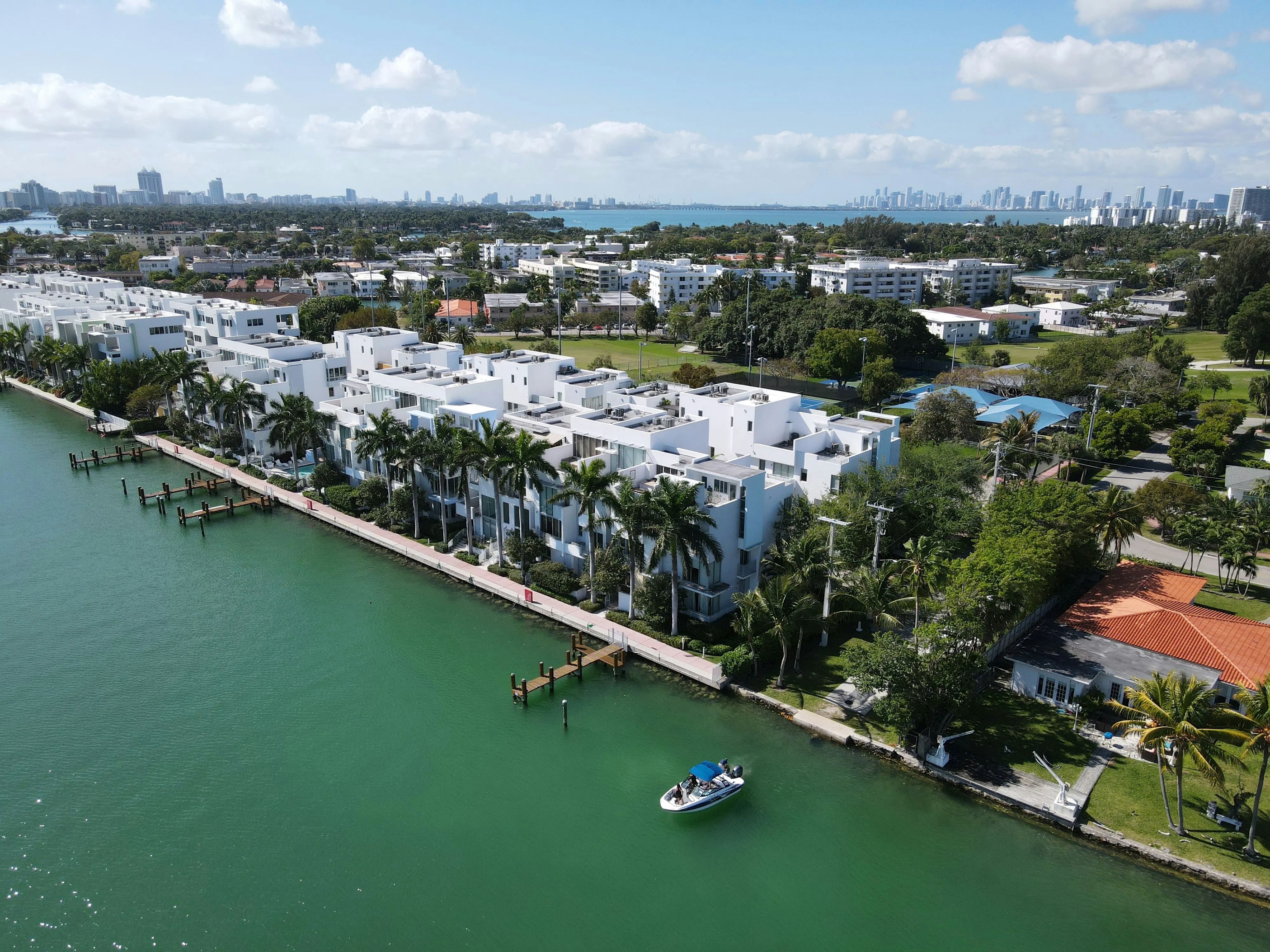 Aerial view of waterfront residences and the bay